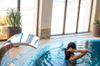 Calmness and harmony in air. Attractive young caucasian woman relaxing in spa indoor swimming-pool.