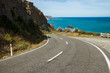Road leading to a bay. Crystal clear water, amazing landscape. Windy road. Travel, adventure, discover, explore, drive, hike. Sea, ocean, environment, sky.