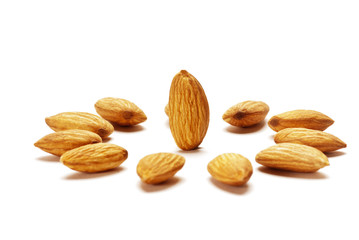 Wall Mural - Almonds isolated on white background