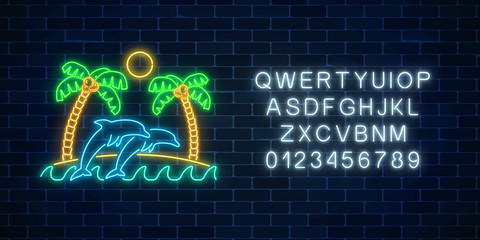 Wall Mural - Glowing neon summer sign with palms, sun, island and jumping dolphins with alphabet in ocean. Shiny summertime symbol.