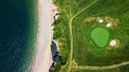 Poster - Drone view of a golf field next to the ocean in Etretat France