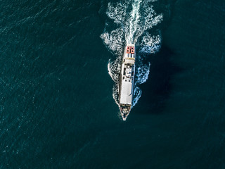 Poster - aerial view of cruise ship passing across the mediterranean sea isolated water texture