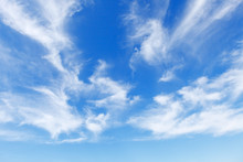 Beautiful Blue Sky Over The Sea With Translucent, White, Cirrus Clouds
