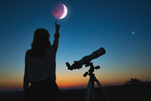 Girl Looking At Lunar Eclipse Through A Telescope. My Astronomy Work.
