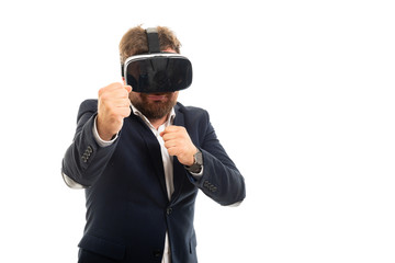 Wall Mural - Portrait of business man wearing vr goggles showing  both fists.