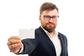 Wall Mural - Selected focus of business man holding blank business card.