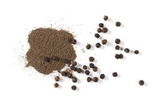 Black ground pepper powder pile with grains, peppercorn isolated on white background, top view
