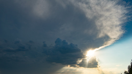 Wall Mural - Sunset over clouds