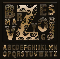 Wall Mural - hand drawn alphabet decorated with graphic doodles in gold and black