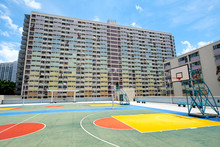 Basketball Stand With Old Public Housing In Hong Kong