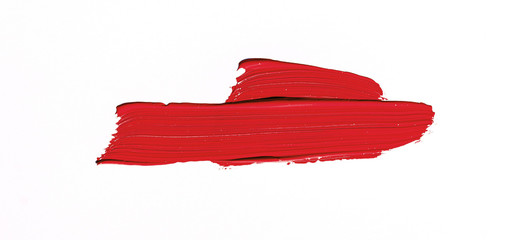 Red brush stroke isolated over white background