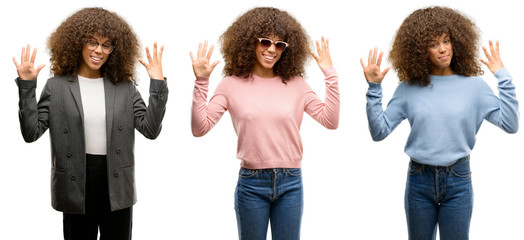 Sticker - African american young woman wearing different outfits showing and pointing up with fingers number nine while smiling confident and happy.