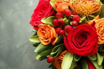 Winter or autumn bouquet with roses