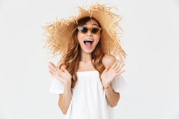 Sticker - Portrait closeup of adorable woman 20s wearing big straw hat and sunglasses posing on camera with happy smile, isolated over white background