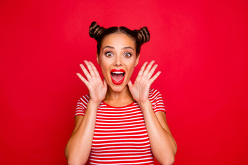 Wall Mural - WOW! Portrait of astonished surprised girl with wide open mouth eyes gesturing with palms near face isolated on red background