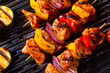 Rustic shish kebab skewers with marinated ham meat paprika and red onion