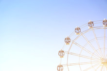 Ferris Wheel On Blue Background