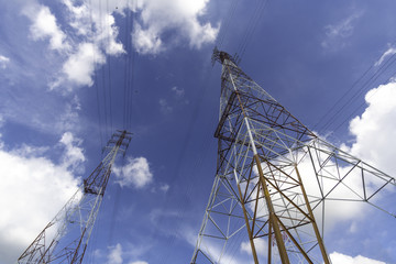 High-voltage tower sky background. Under the high power poles