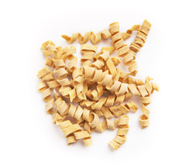 Wall Mural - Pile of raw fusilli isolated on white