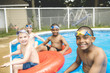 Children in outside swimming pool