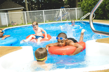 Wall Mural - Children in outside swimming pool