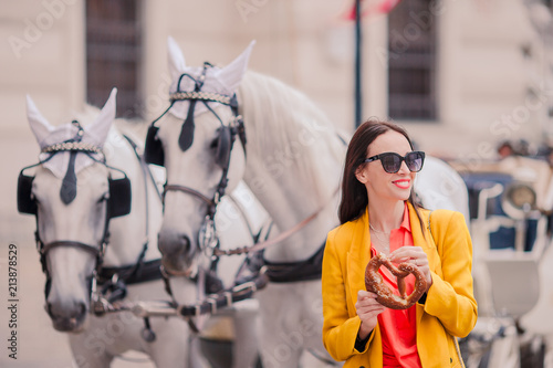 Fotografia, Obraz Tourist girl enjoying her european vacation in Vienna