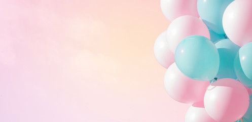 Beautiful panoramic background with pink and blue balloons
