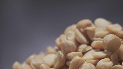 Poster - Peas dry on a dark background, rotation 360 degrees. Macro view.