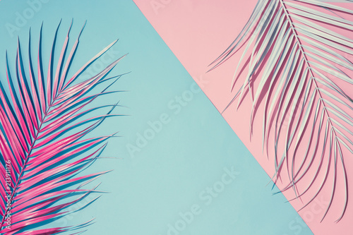 Fotomural Tropical bright colorful background with exotic painted tropical palm leaves