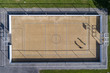 Two people playing basketball, aerial view