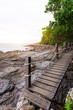 The wooden walkway beside the rock beach at Khao Laem Ya Mu Ko Samet National Park