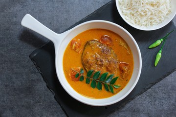 Kerala King Fish Curry served with rice, overhead view