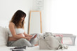 © Trendsetter Images - Pregnant woman checking the last ultrasound