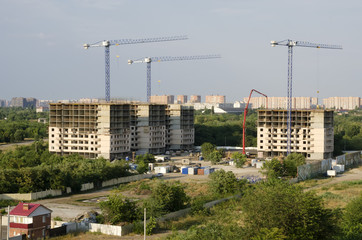 The top view on the building site within the city.