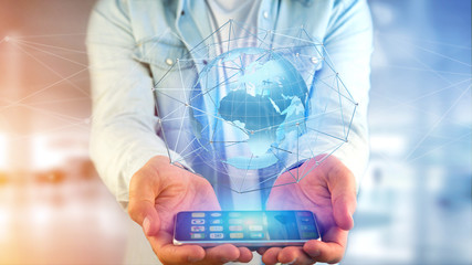 Poster - Businessman using smartphone with a Connected network over a earth globe concept on a futuristic interface - 3d rendering