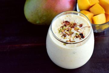 Mango Lassi Garnished with Saffron and Chopped Nuts