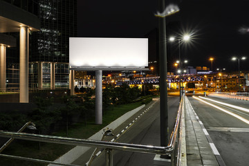 Wall Mural - Blank illuminated billboard near road and tunnel at night. 3d rendering