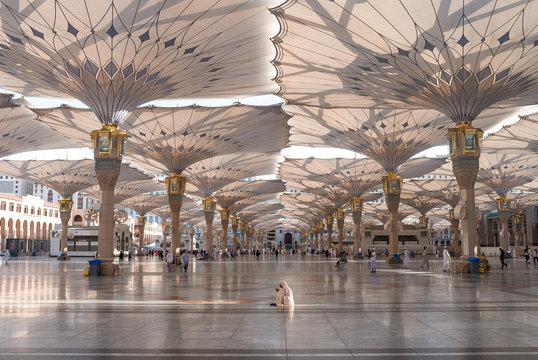 medina, saudi arabia - april 28 2018: these umbrella construction on the square of al-masjid an-naba