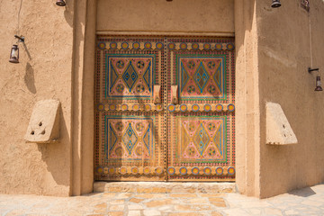 Wall Mural - Authentic Arabian style wooden door with decoration pattern in Riyadh, Saudi Arabia