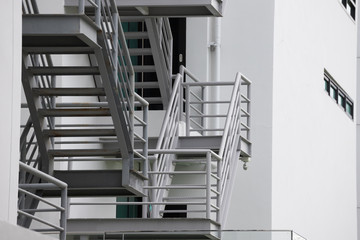 Wall Mural - grey fire exit stair outside of the building.