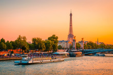 Sunset View Of  Eiffel Tower, Alexander III Bridge And River Seine In Paris, France.
