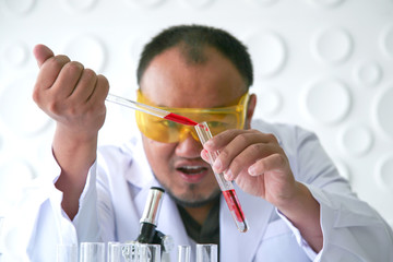 Scientists experiment in laboratory science.