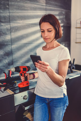 Wall Mural - Woman using smart phone