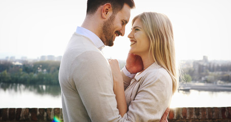 Poster - Happy couple smiling and dating outdoor