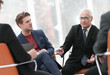 © ASDF - senior businessman holds a meeting with the business team