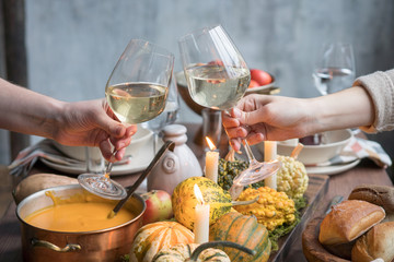 Autumn table setting with pumpkins. Thanksgiving dinner and fall decoration.