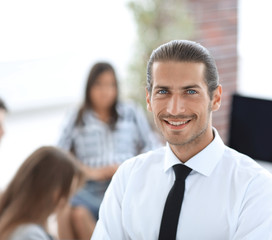 successful young business men on blurred background