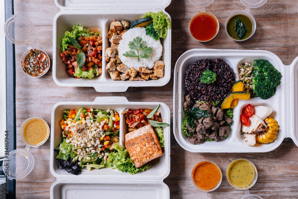 Clean food meal boxes: rice and rice berry with beef, salmon and ...