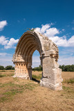 Ruined medieval arch of San Miguel de Mazarreros, in Olmillos de Sasamon. Burgos, Spain.