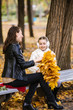 © sushytska - happy mother with her daughter in the autumn park
